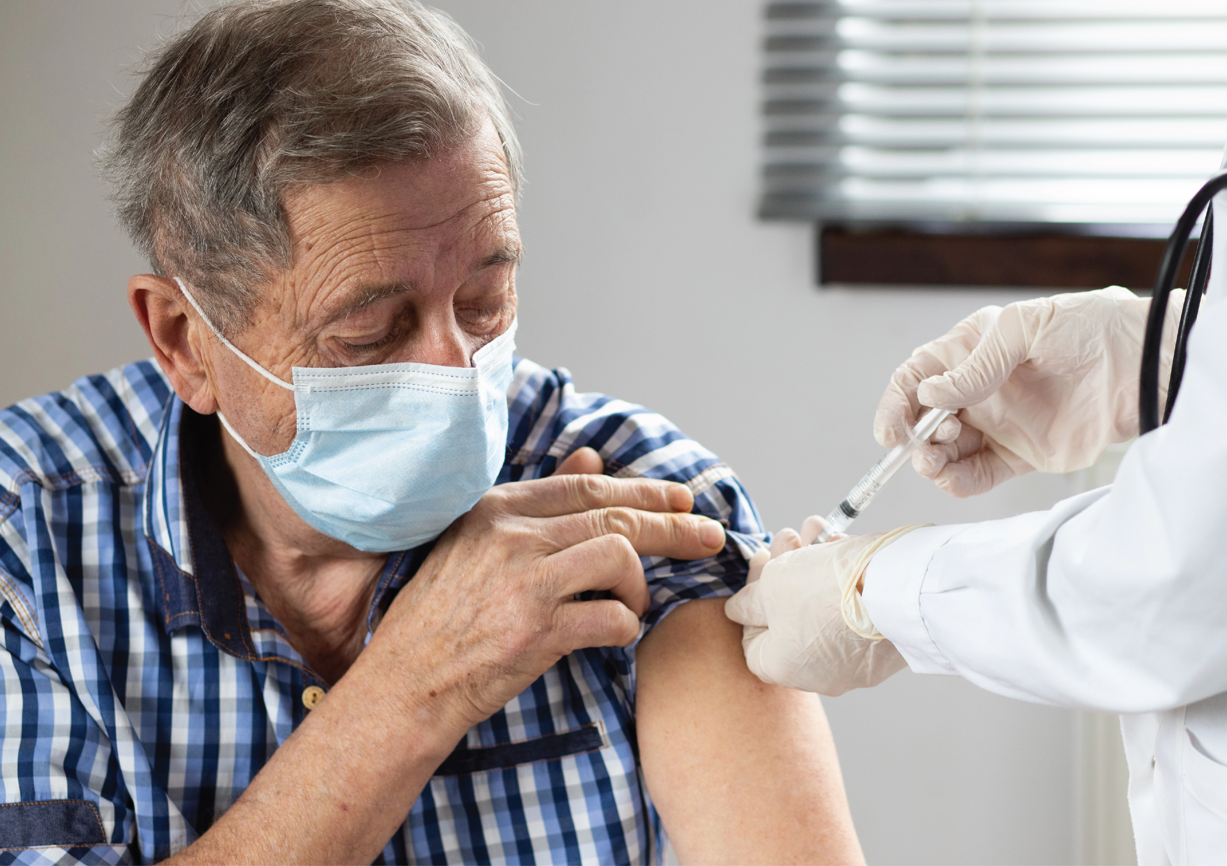 man getting immunization