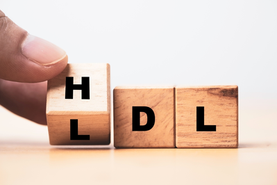 hand flipping wooden block from LDL to HDL