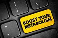 yellow key on keyboard labeled Boost Your Metabolism